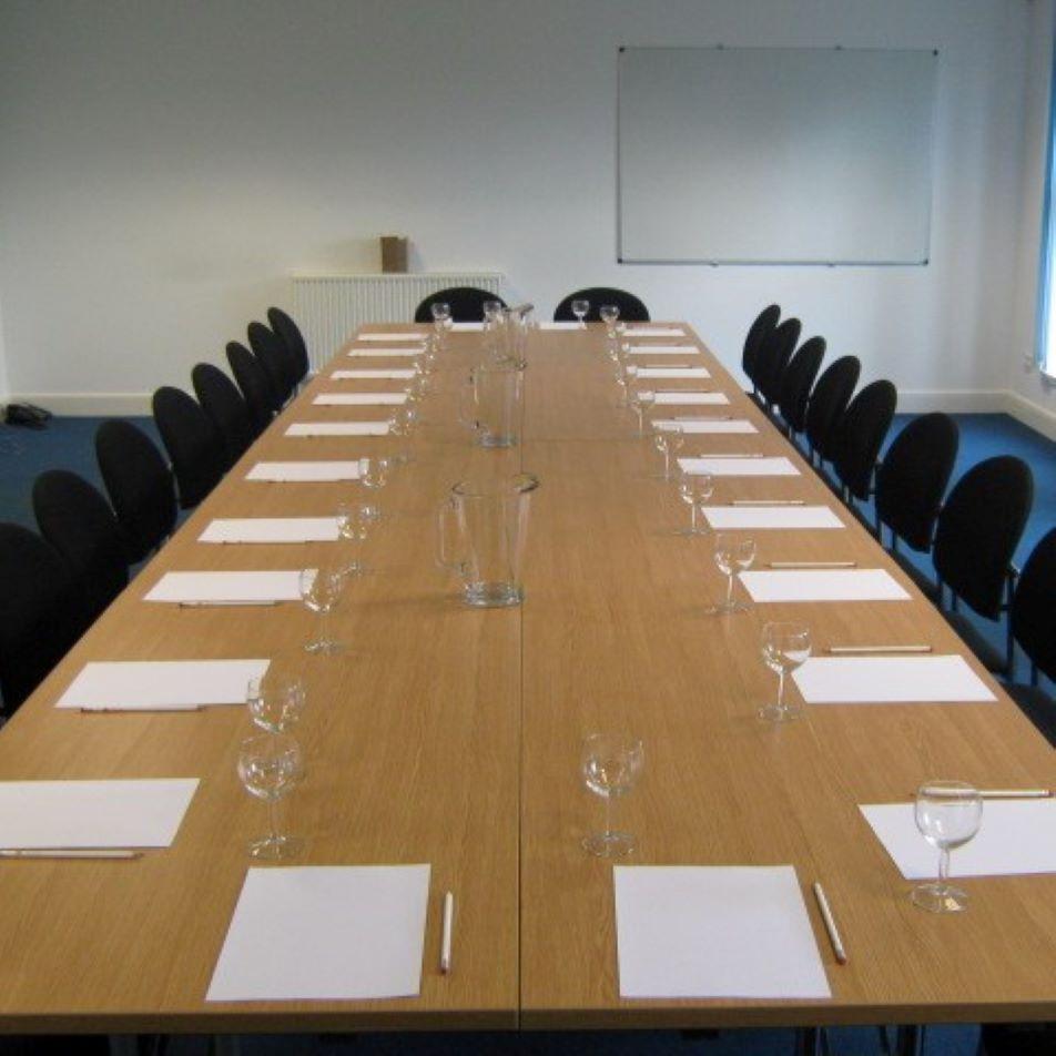 Image of Seminar Room set up for meeting in boardroom style